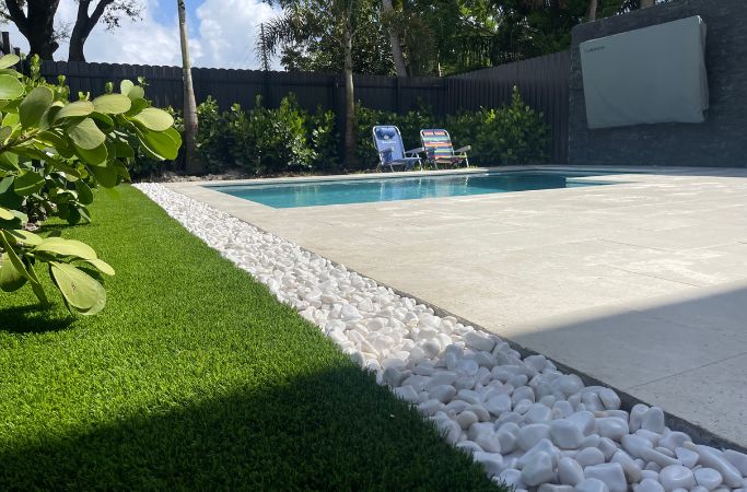 On-Time Turf expert installing artificial grass in Miami Beach, FL, the ideal choice for an eco-friendly, vibrant lawn. Artificial Grass Installation Near Me.